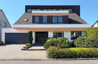 Haus kaufen in 54338 Schweich, Exklusiv: Wohnen mit Möglichkeiten. Pool, Praxis & Einliegerwohnung