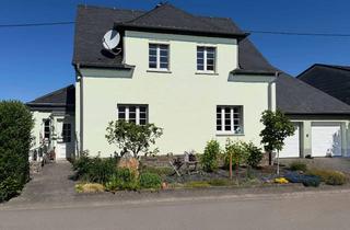 Einfamilienhaus kaufen in 54317 Osburg, Modernisiertes Einfamilienhaus mit Anbau, Doppelgarage und großem Garten