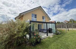 Haus kaufen in 61250 Usingen, Modernes KfW-Effizienzhaus mit Garten und Doppelcarport in ruhiger Ortslage