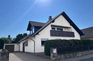 Haus kaufen in 61130 Nidderau, Charmantes Zweifamilienhaus mit großzügigem Platzangebot in Nidderau-Windecken
