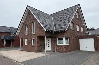 Doppelhaushälfte kaufen in 48599 Gronau, Attraktive Doppelhaushälfte mit Garten, Garage und Studio