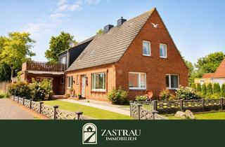 Haus kaufen in 26532 Großheide, Geräumiges Siedlungshaus in ruhiger Sackgassenlage in Großheide