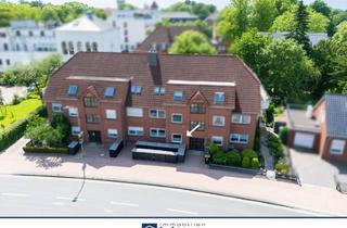 Wohnung kaufen in 26603 Aurich, Vermietete Erdgeschosswohnung mit Garten in der Auricher Innenstadt