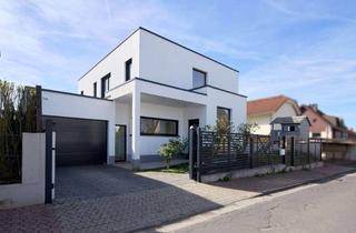 Haus kaufen in 61118 Bad Vilbel, Bauhaus-Architektur mit Einliegerwohnung – modernes Familienhaus mit viel Platz