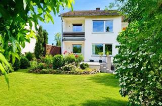 Haus kaufen in 63150 Heusenstamm, Ein Zuhause mir Herz: REH auf außerordentlich breitem Grundstück in familienfreundlicher Lage