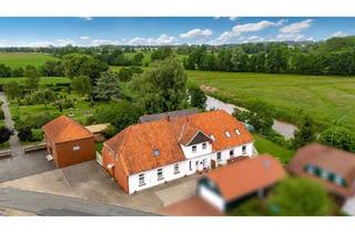 Mehrfamilienhaus kaufen in 21785 Neuhaus, Historisches Mehrfamilienhaus in direkter Flusslage mit großem Entwicklungspotenzial