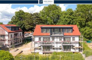 Wohnung kaufen in 23730 Neustadt, Lichtverwöhnter Erstbezug über den Dächern von Neustadt