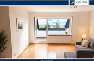 Wohnung kaufen in 63225 Langen, Lichtdurchflutete Dachgeschosswohnung mit Balkon und Weitblick in der Innenstadt von Langen