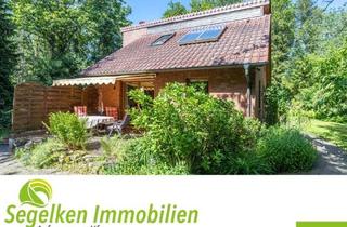 Haus kaufen in 27243 Kirchseelte, Kirchseelte - Interessant gebautes und idyllisch gelegenes Haus mit Garage und großem Garten in Kirchseelte