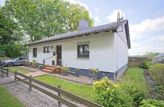Haus kaufen in 27612 Loxstedt, Loxstedt - Volksbank Immobilien: Bungalow - Gemütlichkeit trifft auf Gartenidylle!