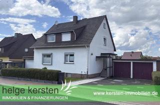 Haus kaufen in 34277 Fuldabrück, Fuldabrück - Wohnen, vermieten oder beides - Flexibles Zweifamilienhaus mit schönem Garten in Fuldabrück-Dörnhagen zu verkaufen!