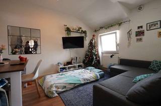 Wohnung kaufen in 65428 Rüsselsheim, Charmante Dachgeschosswohnung in zentraler Lage von Rüsselsheim