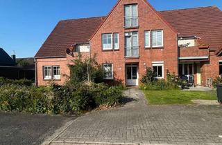 Wohnung kaufen in 26434 Wangerland, Moderne Erdgeschosswohnung mit Terrasse nahe Nordsee