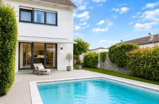 Haus kaufen in 79299 Wittnau, Einziehen, Wohlfühlen, Genießen – Modernes Reihenendhaus mit Pool und EEK A+ in Wittnau