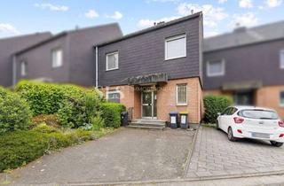 Haus kaufen in 45772 Marl, Überraschend viel Platz: Familienhaus mit ausgebautem Dachgeschoss, Hobbyraum und zwei Garagen