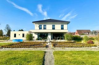 Einfamilienhaus kaufen in 26639 Wiesmoor, Neuwertiges Einfamilienhaus mit großzügigem Grundstück