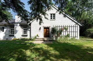 Villa kaufen in 40885 Ratingen, Ein Refugium zwischen Wald, Bachlauf und altem Baumbestand – Exklusive Architektenvilla in Bestlage