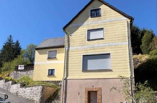 Einfamilienhaus kaufen in 96355 Tettau, Ruhig wohnen, naturnah leben - Einfamilienhaus mit großer Terrasse und Garage