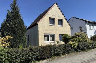 Einfamilienhaus kaufen in 28755 Bremen, Vermietetes freistehendes Einfamilienhaus mit Garage und idyllischem Garten in gefragter Wohnlage