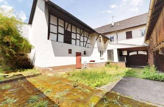Einfamilienhaus kaufen in Licher Pforte, 35423 Lich, Renovierungsbedürftiges Einfamilienhaus mit Garten und Doppelgarage