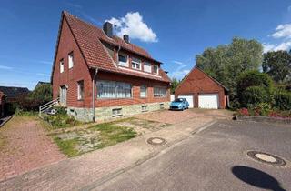 Haus kaufen in 48249 Dülmen, Zweifamilienhaus mit Baureserve in Dülmen-Rorup