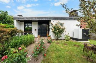 Haus kaufen in 28844 Weyhe, Lichtdurchfluteter Atriumbungalow mit Wärmepumpe und großzügigem Garten