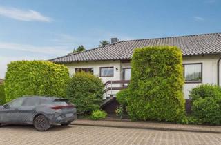Doppelhaushälfte kaufen in 30826 Garbsen, Doppelhaushälfte mit Winkel-Bungalow Charakter