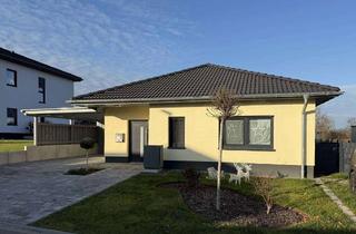 Haus kaufen in Zur Tränke 20, 06766 Bitterfeld-Wolfen, Nur noch wenige Grundstücke: Neubau-Bungalow im Baugebiet „Zur Tränke“ in Top-Grünlage von Thalheim