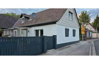 Einfamilienhaus kaufen in 63683 Ortenberg, Charmantes Einfamilienhaus mit großer Scheune und vielseitigem Entwicklungspotenzial in Ortenberg-Se