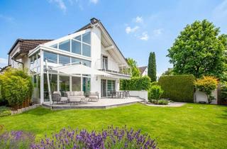 Haus kaufen in 63110 Rodgau, Exklusives Familiendomizil mit Wellnessbereich, PV Anlage, neuer Wärmepumpe - Wohnkomfort auf 321 m²