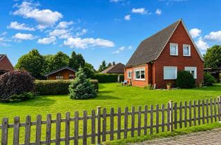 Einfamilienhaus kaufen in 26802 Moormerland, Gemütliches Einfamilienhaus mit großem Grundstück und vielseitigen Nebengebäuden