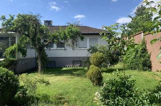 Haus kaufen in 46514 Schermbeck, Freistehender Walmdachbungalow mit großem Wintergarten und Garage in der Nähe des Ortskerns!