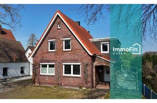 Einfamilienhaus kaufen in 26340 Zetel, Vorne gut erreichbar, hinten grüner Rückzugsort – Haus mit Gewerbe & großem Grundstück