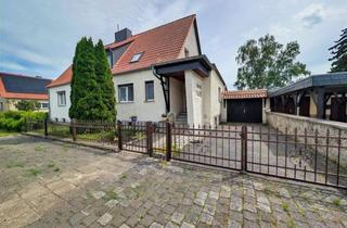 Doppelhaushälfte kaufen in 38820 Halberstadt, Charmante Doppelhaushälfte mit Schlossblick auf großzügigem Grundstück