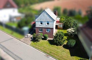 Einfamilienhaus kaufen in 37355 Gerterode, Raum für Ideen – Einfamilienhaus mit Potenzial in ruhiger Lage in Gerterode!