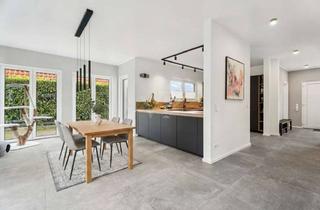 Haus kaufen in 48496 Hopsten, Ein Zuhause, das moderne Architektur, hochwertigen Wohnkomfort und naturnahes Leben miteinander verb
