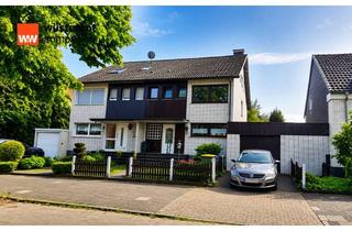 Doppelhaushälfte kaufen in 46149 Buschhausen, Top modernisierte Doppelhaushälfte mit großer Garage in bester Lage