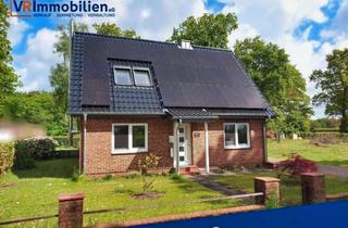 Einfamilienhaus kaufen in 24806 Lohe-Föhrden, Ihr neues Zuhause: Modernisiertes Einfamilienhaus mit großem Garten, zwei Garagen und PV-Anlage