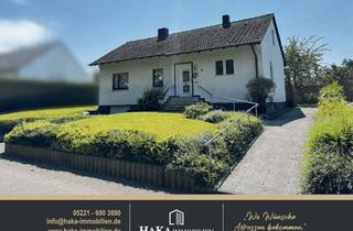 Einfamilienhaus kaufen in 32584 Löhne, Einfamilienhaus mit Weitblick, großem Grundstück & viel Potenzial – in Löhne