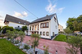 Einfamilienhaus kaufen in 56422 Wirges, Charmantes Einfamilienhaus mit kernsanierter Einliegerwohnung und mediterranem Garten