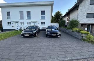 Haus kaufen in Bergstraße XXX, 53578 Windhagen, Ruhige Lage und moderne Ausstattung! Lichtvolle DHH inkl. Garage & Wallbox!