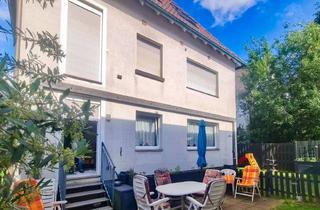Anlageobjekt in 63128 Dietzenbach, Ein Haus für die Zukunft. Drei Wohnungen. Viele Möglichkeiten.