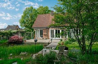 Einfamilienhaus kaufen in 22969 Witzhave, Witzhave - Lichtdurchflutetes Architektenhaus mit Schwimmteich