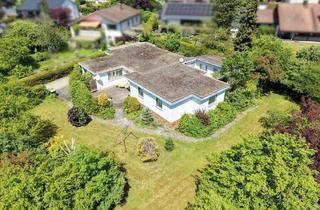 Haus kaufen in 96450 Coburg, Coburg - Großzügiger Winkelbungalow auf traumhaft eingewachsenem 1.626 m² großem Grundstück in begehrter Lage