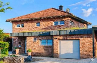 Einfamilienhaus kaufen in 34225 Baunatal, Baunatal - Exklusives energieeffizientes Einfamilienhaus