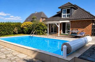 Haus kaufen in 25335 Bokholt-Hanredder, Familientraum mit eigenem Pool und Weitblick - Modernes Wohnen in ruhiger Lage