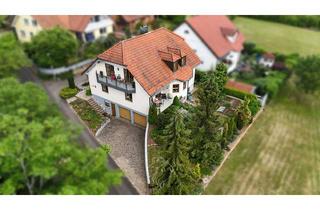 Einfamilienhaus kaufen in 97450 Arnstein, Familienidylle mit traumhaftem Blick – gepflegtes Einfamilienhaus mit Südgarten und Doppelgarage