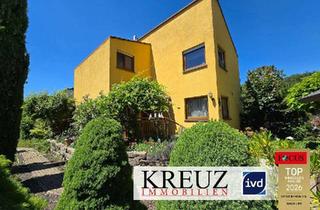 Haus kaufen in 64572 Büttelborn, Großzügiges Reihenendhaus in Büttelborn mit Teich und Garagen