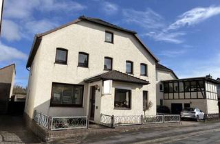Haus kaufen in 31860 Emmerthal, Großzügiges Wohnhaus mit Anbau, Garten und zwei Garagen – Zentrumsnahe Lage, ideal für Familien!
