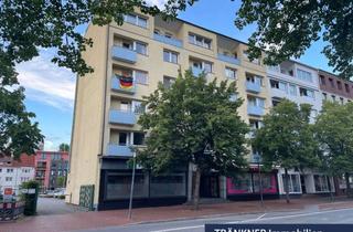 Anlageobjekt in 27568 Mitte, TRÄNKNER Immobilien - 13-Familienhaus mit zwei kleinen Ladengeschäften
